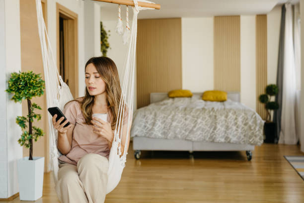 istock Woman at home using social media 1439922647