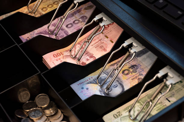 istock Thai bank notes in the cashier machine 1439931440