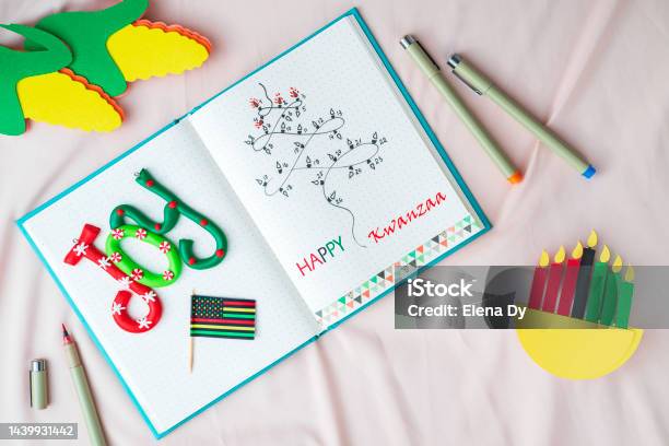 Homemade Bullet Journal With Kwanzaa Calendar Stock Photo - Download Image Now - Kwanzaa, African-American Culture, Black Color