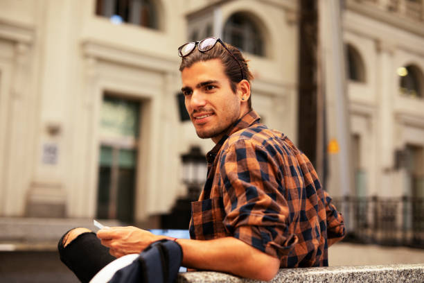 istock Young man buying online with credit card. 1439935588