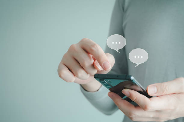 istock Man hand using smart phone and chatting online messaging and social network. Social media and digital online, Internet searching, Connection, Communication and wireless technology concept. 1439940724