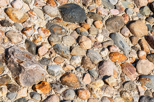 Pebbles and wall background