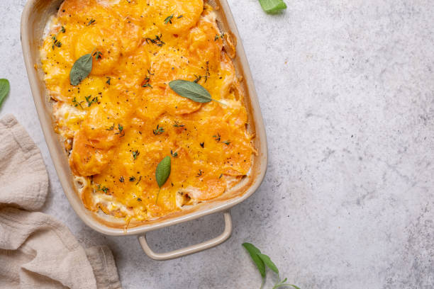 istock Sweet potato gratin with cream in baking dish 1439946257