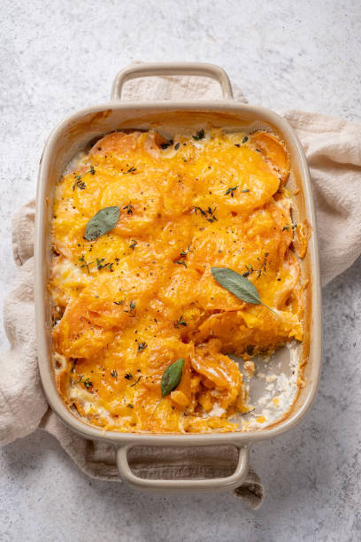 istock Sweet potato gratin with cream in baking dish 1439946264