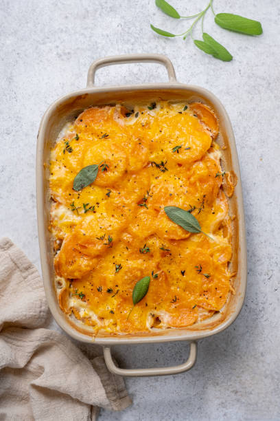 istock Sweet potato gratin with cream in baking dish 1439946279