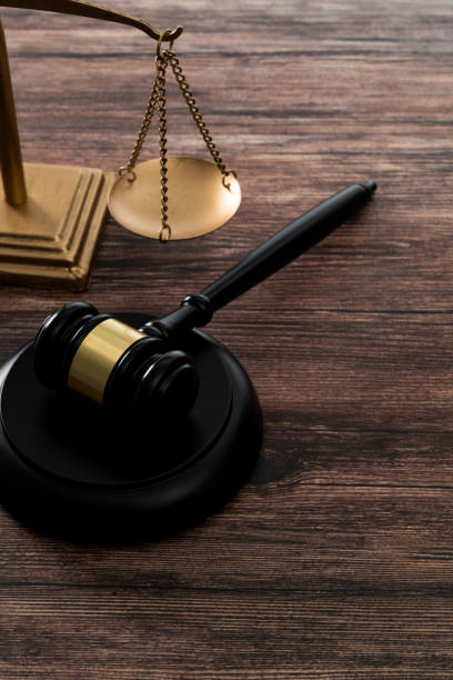 istock Gavel and scales of justice on the table 1439947651