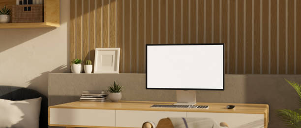 istock Modern minimal Scandinavian home workspace in bedroom with computer mockup on wood table 1439948047