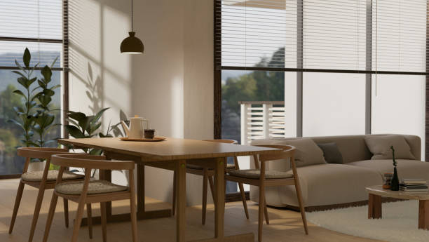 istock Modern contemporary and cozy living room with dining table interior, comfortable beige sofa 1439948055
