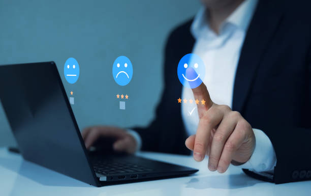 istock Customer review satisfaction feedback.Gives leave feedback on the bought product with gold five star rating feedback on virtual sreen. 1439951959