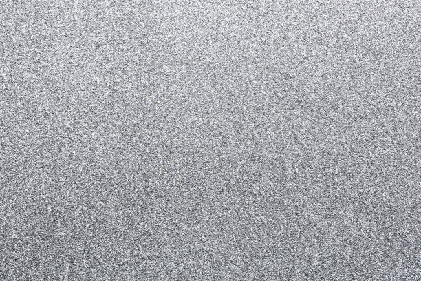 istock new year silver color glitter paper abstract, natural texture background 1439953224