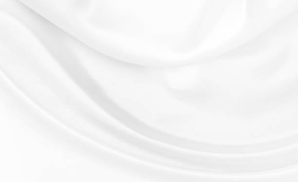 istock White gray satin texture that is white silver fabric silk background with beautiful soft blur pattern natural. 1439957795