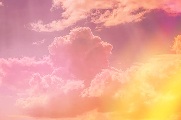 istock Duotone Toned Pink yellow Clouds Cloud Sky. Background Cloudscape Abstract colors. 1439960270