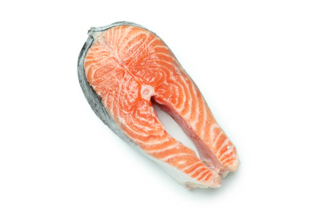 istock Fresh raw salmon isolated on white background 1439961899