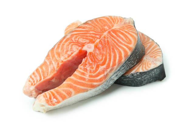 istock Fresh raw salmon isolated on white background 1439962335
