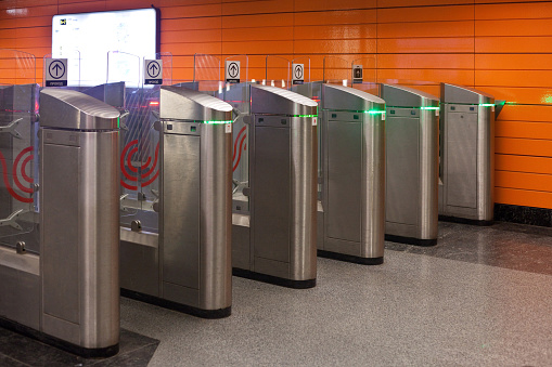 Moscow, Russia – October 02 2019: Automatic ticket control gate on the subway system in Moscow. Exit from the metro. Translation: Passage