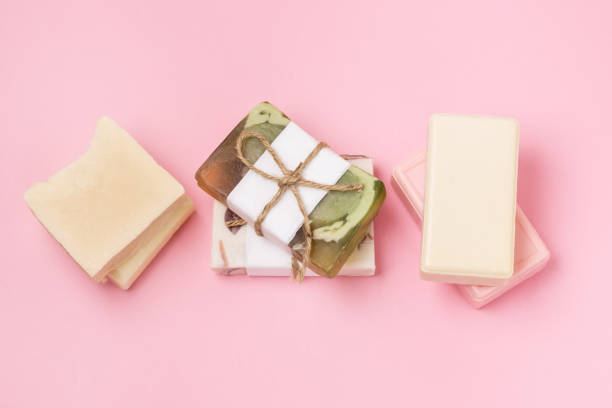 istock Essential Oil Soaps on Pink Pastel Background Handmade Soaps Horizontal Body Care 1439971729