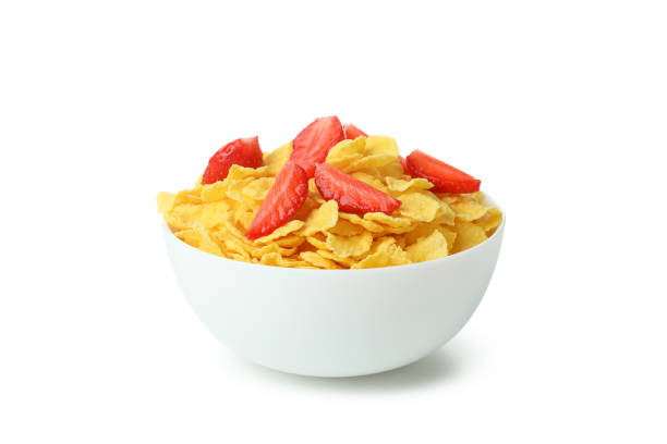 istock Plate of corn flakes and strawberry isolated on white background 1439971957