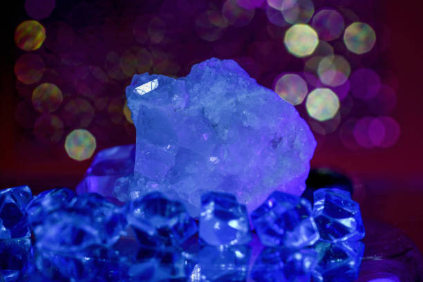 istock Quartz with mineral crystals against a black background 1439972182
