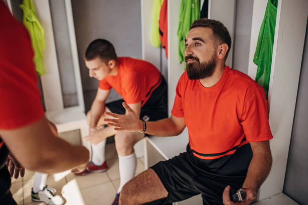 istock Soccer players in locker room 1439972988
