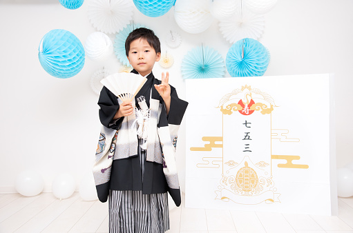 5-year-old Japanese boy taking a commemorative photo wearing a hakama at Shichigosan