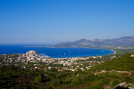 A view of Capri from a high point showing the town and the coastline