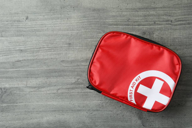 istock First aid medical kit on gray textured table 1439974831