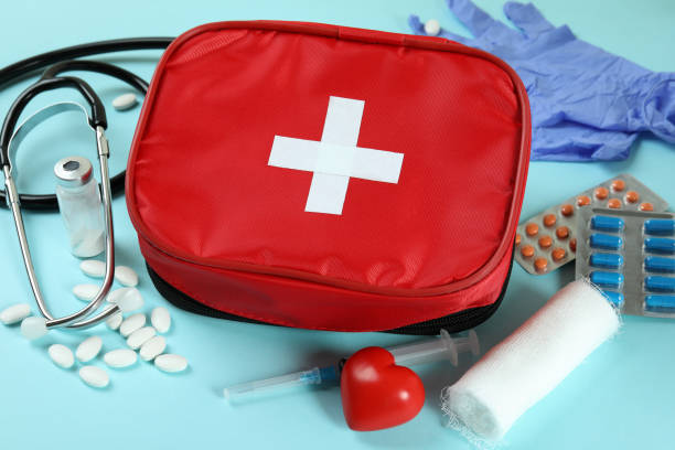 istock First aid medical kit on blue background 1439974909