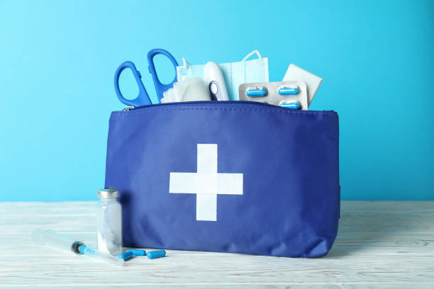 istock First aid medical kit against blue background 1439975379