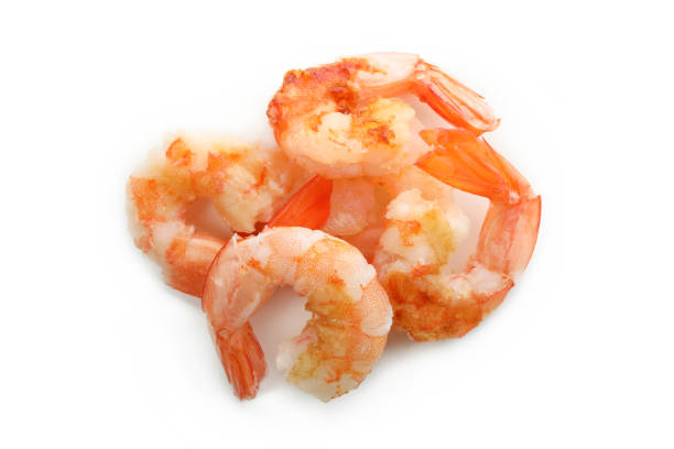 istock Tasty grilled shrimps isolated on white background 1439976860