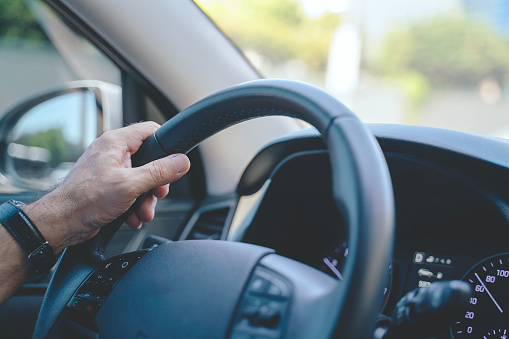 Hands on steering wheel, Driving car