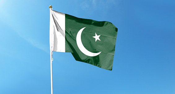 Pakistan flag on cloudy sky. waving in the sky