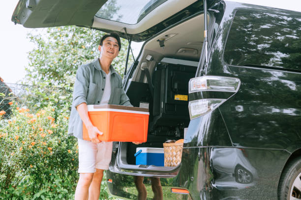 Asian young man  preparation for journey in summertime