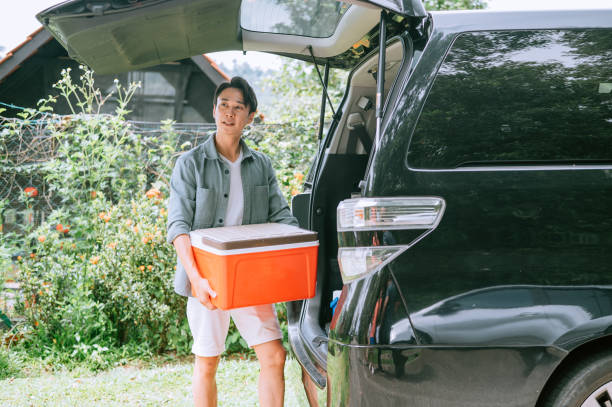 istock Asian young man  preparation for journey in summertime 1439982119