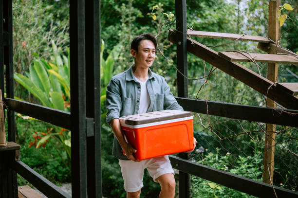 Asian young man  preparation for journey in summer time
