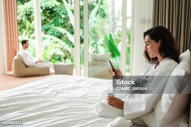 Woman Enjoying The Lazy Morning On Her Luxury Vacation Stock Photo - Download Image Now