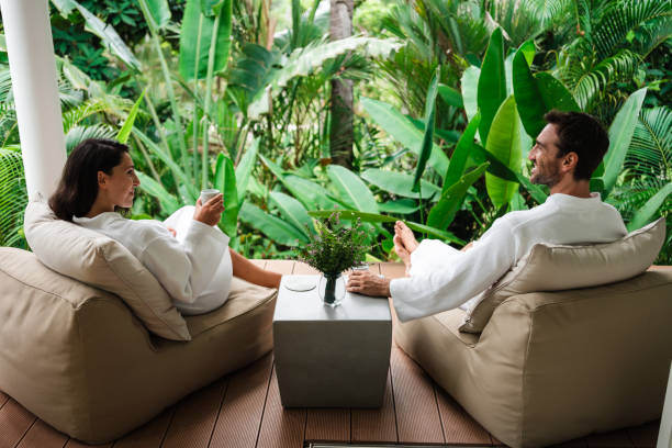 istock Couple enjoying relaxing morning on vacation 1439982688