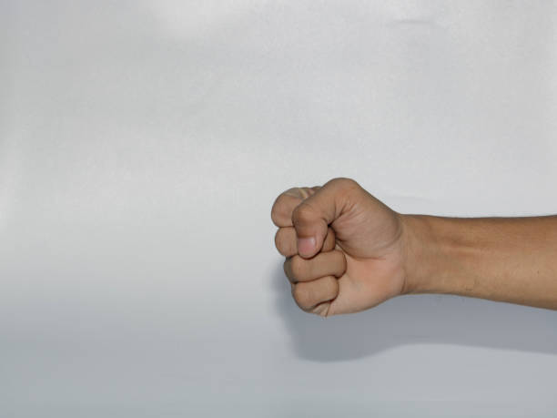 istock Man clenching fist, 1439982827