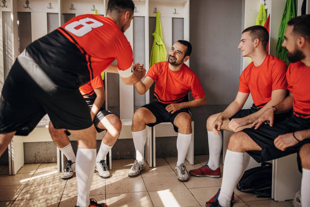 istock Soccer players in locker room 1439985089