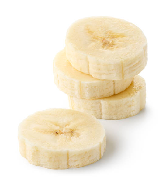 Stack of banana slices on white background