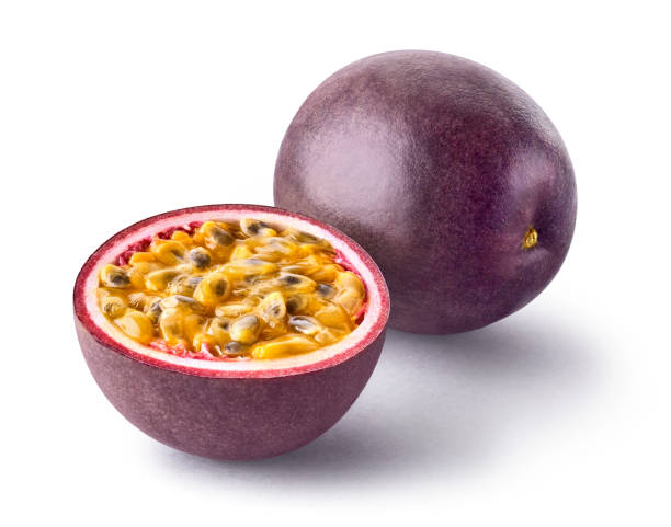istock Whole and half passion fruit isolated on white background 1439985835
