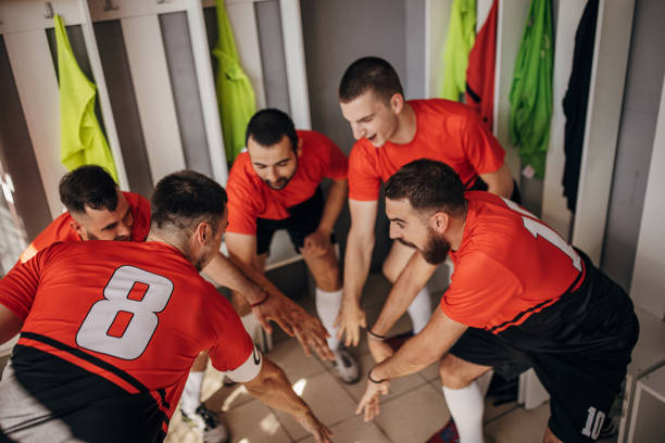 istock Soccer players in locker room 1439985972