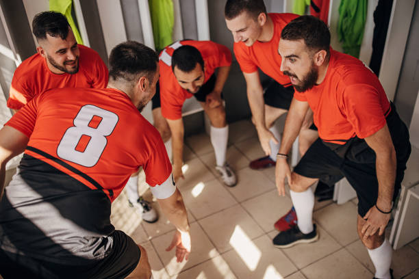 istock Soccer players in locker room 1439986005