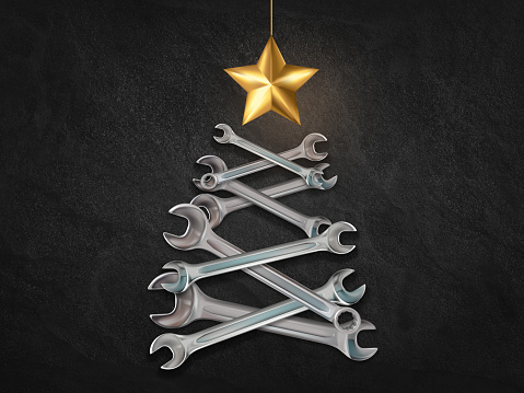 Christmas tree design make out of wrenches tools, Christmas industrial concept.