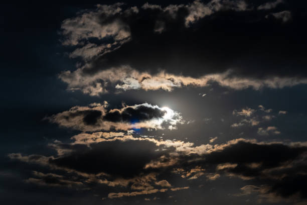 istock Beautiful moonlit sky with clouds. Night at twilight 1439998796