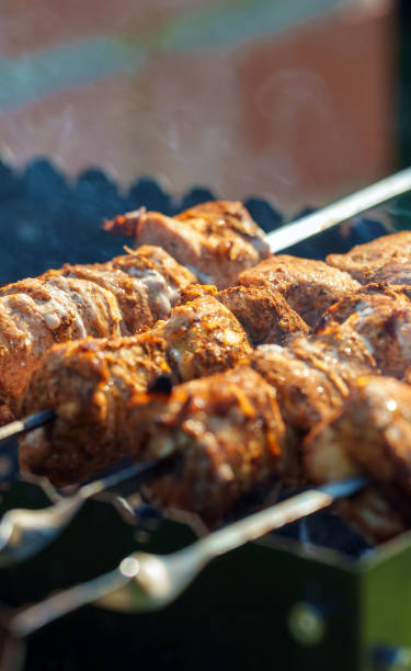 istock Tasty pork shashlik on the grill. 1440001145