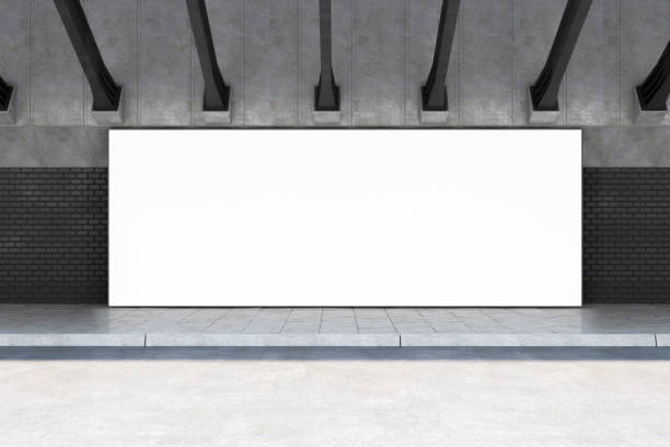 istock Front view on blank white billboard with space for your logo or text on dark brick wall in abstract empty tunnel hall. 3D rendering, mockup 1440002006