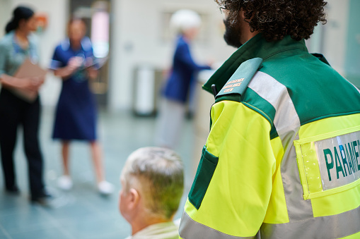 paramedic bringing patient to hospital