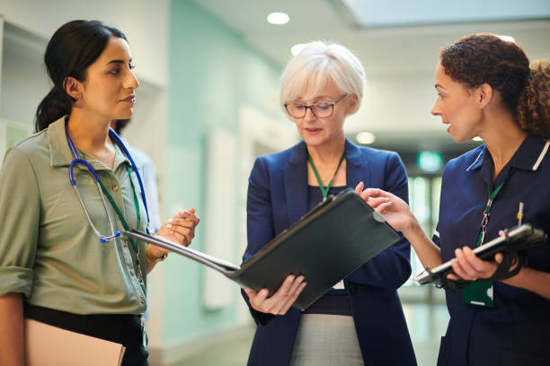 istock hospital team with administrator 1440003644