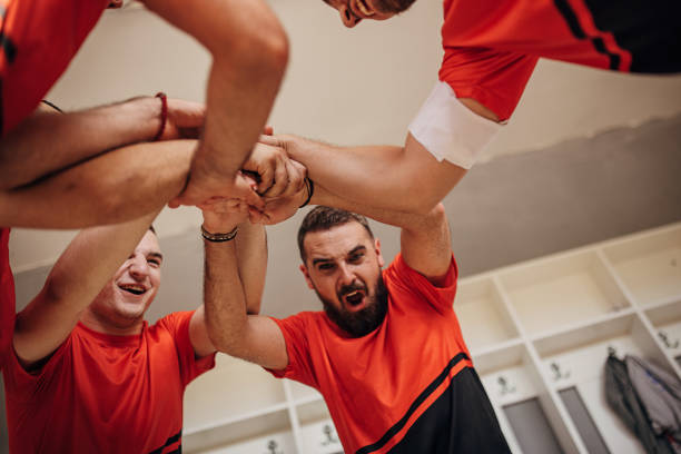 istock Soccer players in locker room 1440004536