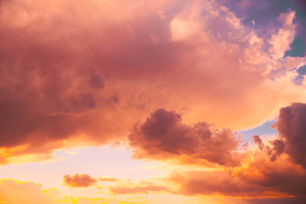 istock Amazing natural bright dramatic sky in different colours during sunset sunrise time. Colorful sky background. Beauty in nature. Sunset sky natural abstract background in pink purple yellow orange colors 1440005214